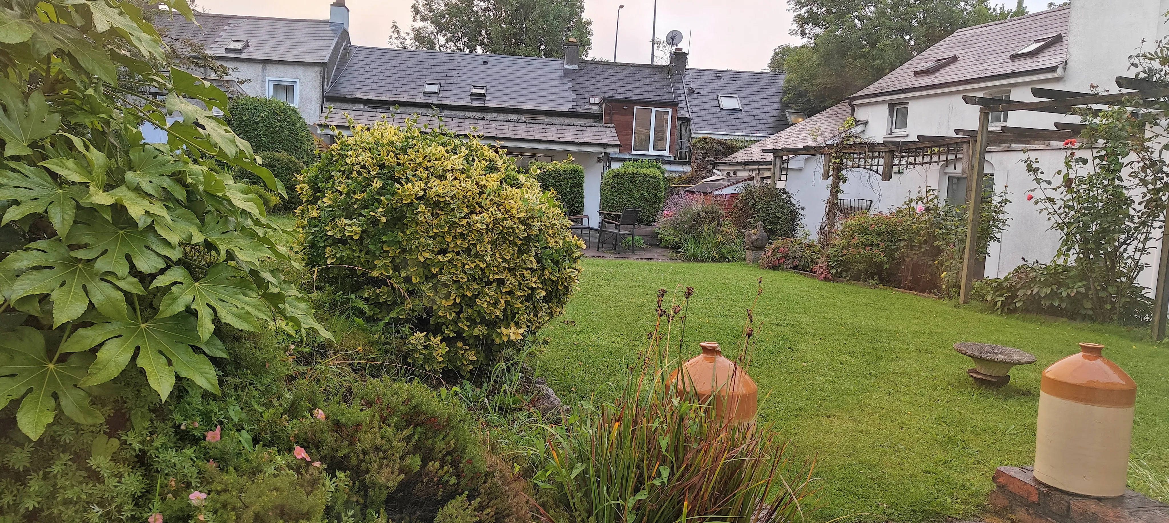 The bed-and-breakfast and the conference hotel in Cork